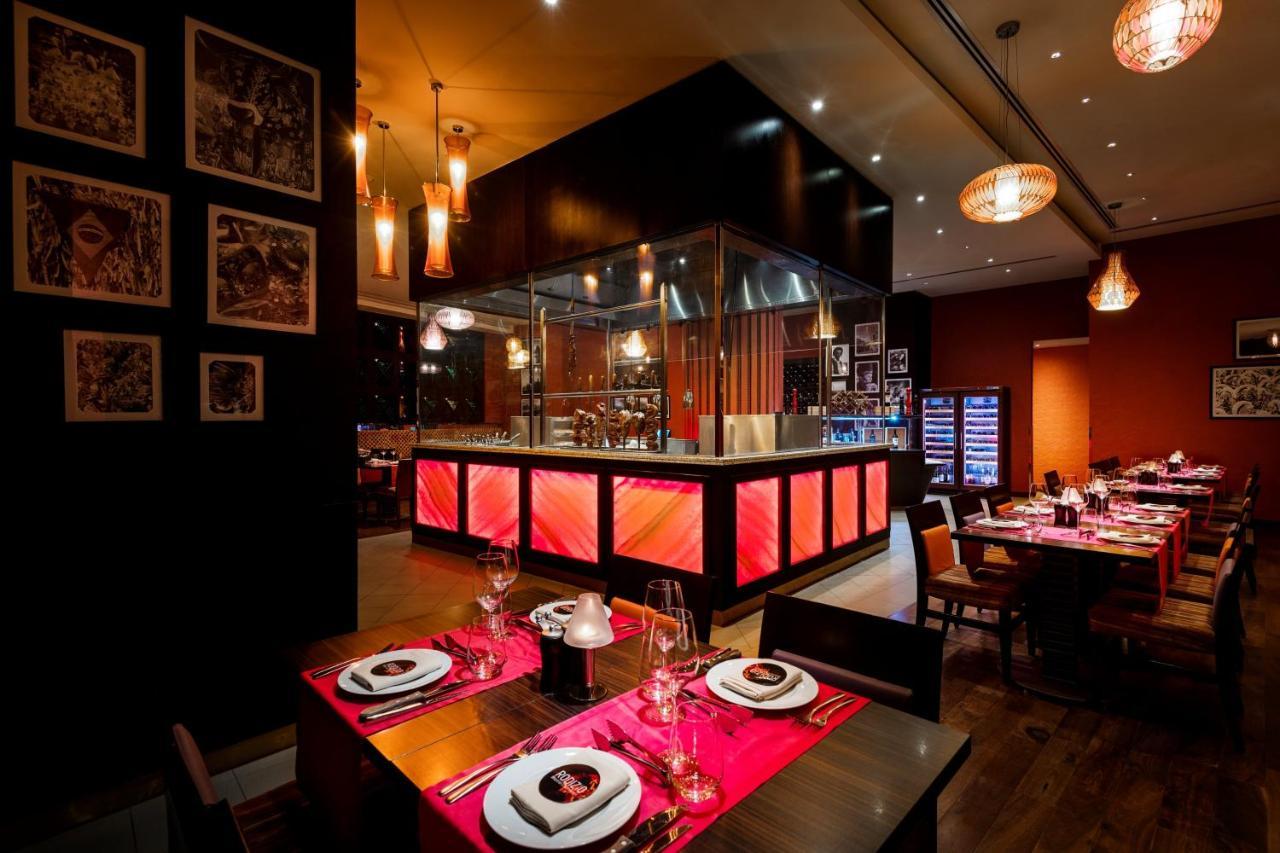 Crowne Plaza Doha - The Business Park By Ihg Hotel Bagian luar foto The interior of the restaurant
